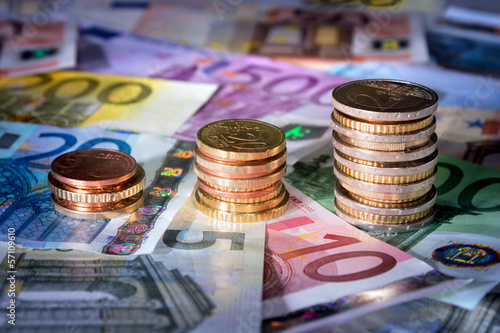 Photo: coins chart on euro banknotes coins chart on euro banknotes