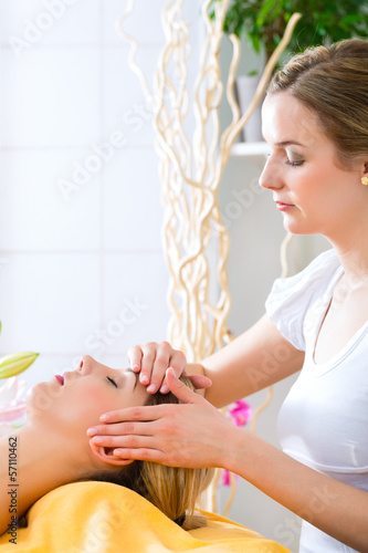 Photo: Wellness - woman getting head massage in Spa Wellness - woman getting head massage in Spa