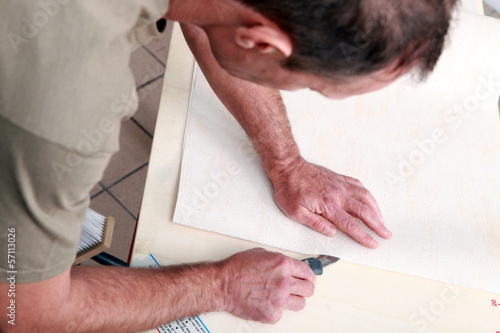 Photo: Craftsman cutting paper Craftsman cutting paper