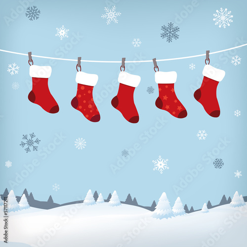 Vector: christmas stockings in winter landscape christmas stockings in winter landscape