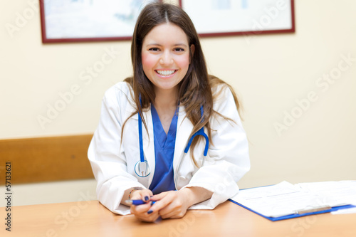 Photo: Female doctor in her studio Female doctor in her studio