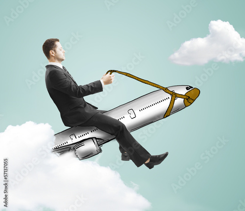 Photo: man sitting on airliner man sitting on airliner