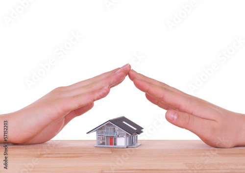 Photo: Schützende Hände über Haus Schützende Hände über Haus