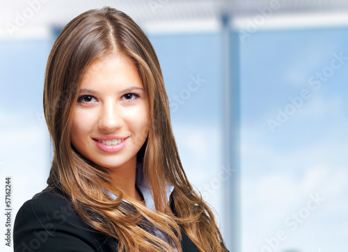 Photo: Smiling businesswoman portrait Smiling businesswoman portrait