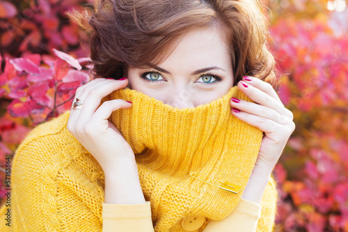 Photo: Pretty woman in autumn park Pretty woman in autumn park