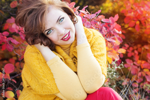 Photo: Pretty woman in autumn park Pretty woman in autumn park