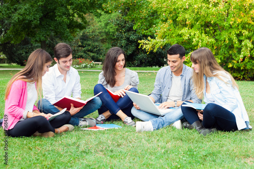 Photo: Students studying on the grass Students studying on the grass