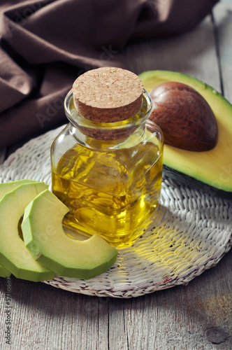 Photo: Bottle of avocado essential oil Bottle of avocado essential oil