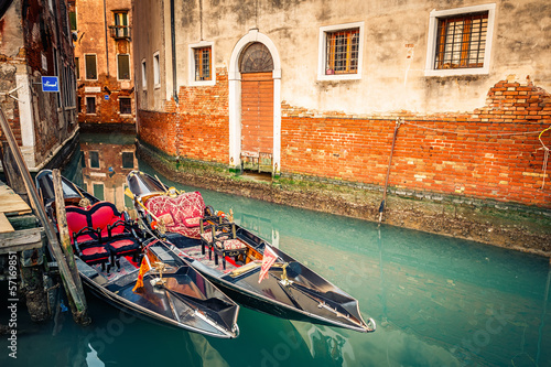 Photo: Gondolas on canal in Venice Gondolas on canal in Venice