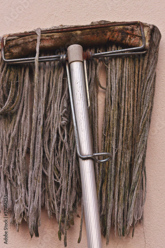 Photo: Dirty swab placed outside the kitchen wall Dirty swab placed outside the kitchen wall