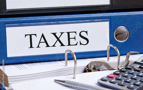 Photo: Taxes Binder in the Office Taxes Binder in the Office