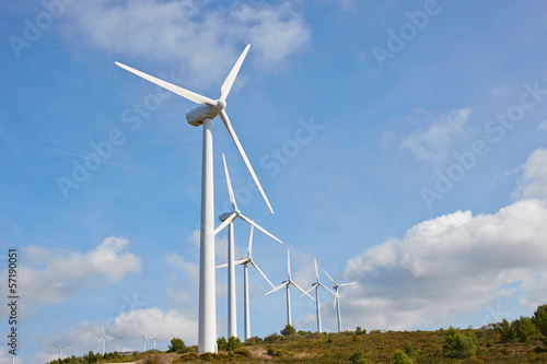 Photo: Group of windmills for renewable electric energy production Group of windmills for renewable electric energy production