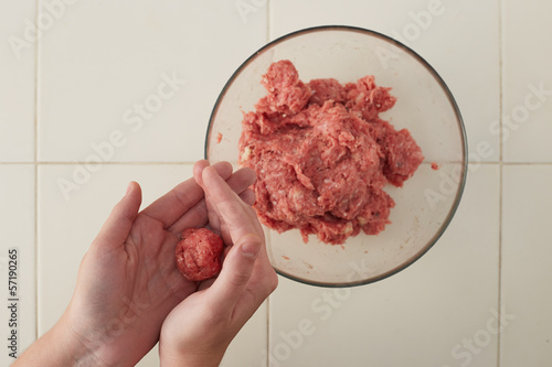 Photo: Cook hands making meatballs Cook hands making meatballs