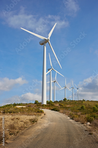 Photo: Group of windmills for renewable electric energy production Group of windmills for renewable electric energy production