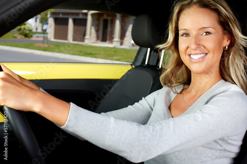 Photo: Woman car driver. Woman car driver.