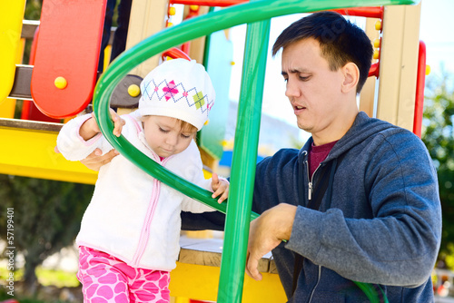 Photo: father and daughter on the playground father and daughter on the playground