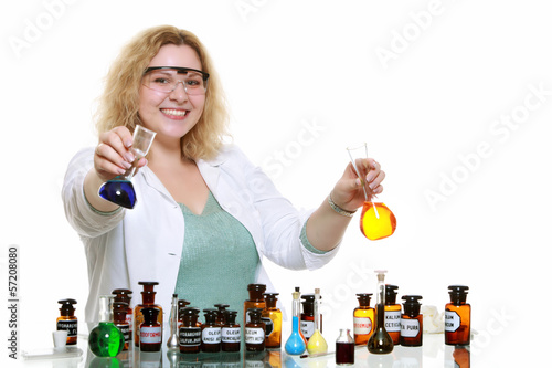 Photo: chemist woman with chemical glassware flask isolated chemist woman with chemical glassware flask isolated
