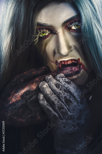 Photo: Dark halloween horror portrait. Creepy vampire Dark halloween horror portrait. Creepy vampire