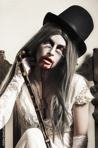 Photo: Grunge ghost girl with blood mouth. Dark fine art Grunge ghost girl with blood mouth. Dark fine art