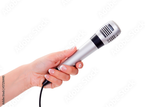 Photo: Woman holding microphone Woman holding microphone