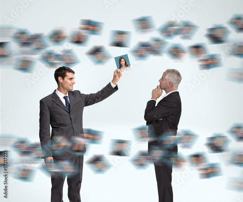 Photo: Businessmen working together Businessmen working together