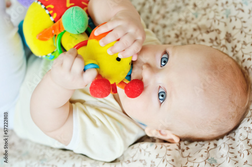 Photo: baby biting toy baby biting toy
