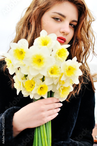 Photo: teen girl with daffodils teen girl with daffodils