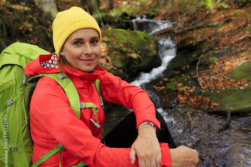 Photo: Autumn trek - woman on mountain hike Autumn trek - woman on mountain hike