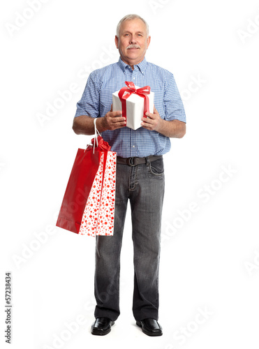 Photo: Senior man with gift Senior man with gift