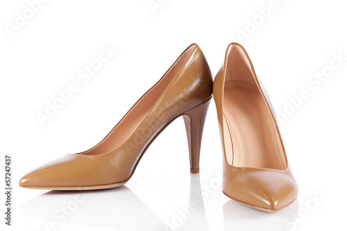 Photo: Woman shoes isolated on white. Woman shoes isolated on white.
