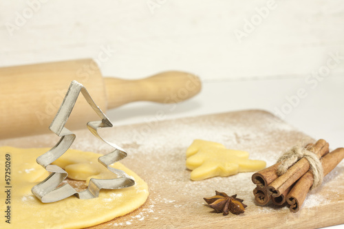 Photo: Christmas baking food concept with tree and dough Christmas baking food concept with tree and dough