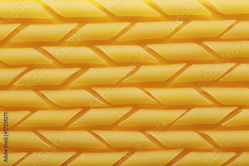 Photo: Raw pennoni pasta texture Raw pennoni pasta texture