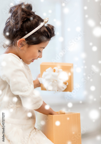 Photo: happy child girl with gift box happy child girl with gift box