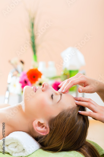 Photo: Wellness - woman getting head massage in Spa Wellness - woman getting head massage in Spa