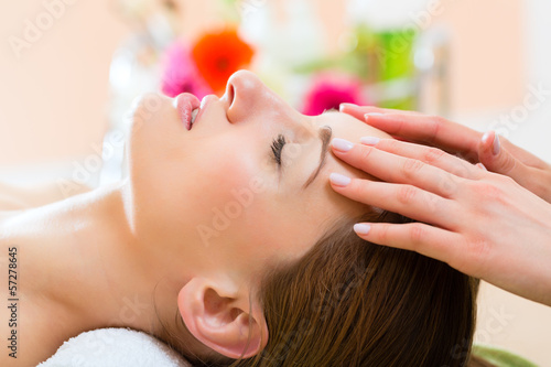 Photo: Wellness - woman getting head massage in Spa Wellness - woman getting head massage in Spa