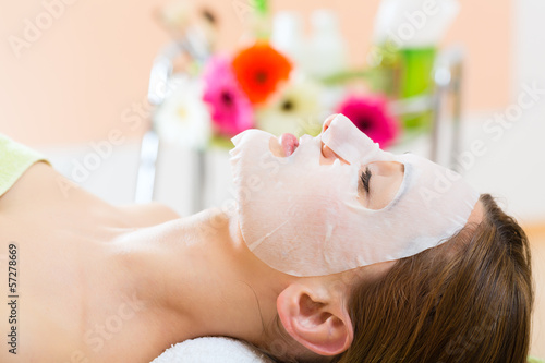 Photo: Wellness - woman getting face mask in spa Wellness - woman getting face mask in spa