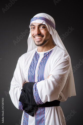 Photo: Arab in the dark room Arab in the dark room
