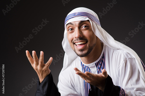 Photo: Arab in the dark room Arab in the dark room