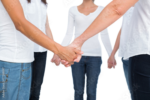 Photo: Female hands joined in a circle Female hands joined in a circle