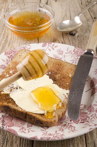 Photo: honey on a slice of toast honey on a slice of toast
