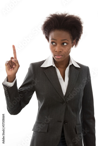 Photo: Farbige Frau erhebt den Finger - meldet sich zu Wort Farbige Frau erhebt den Finger - meldet sich zu Wort