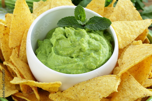 Photo: cup with guacamole and corn chips cup with guacamole and corn chips