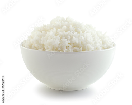 Photo: Rice in a bowl on a white background Rice in a bowl on a white background