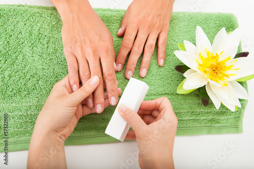 Photo: Beautician Polishing The Nails Beautician Polishing The Nails