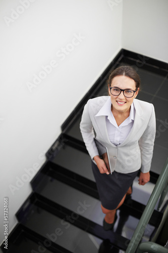 Photo: Woman on staircase Woman on staircase