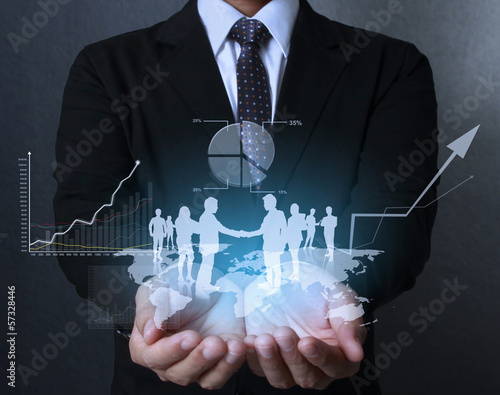 Photo: financial symbols coming from hand financial symbols coming from hand