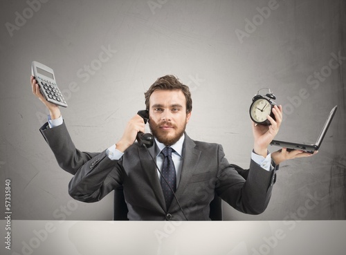 Photo: Businessman multitasking Businessman multitasking