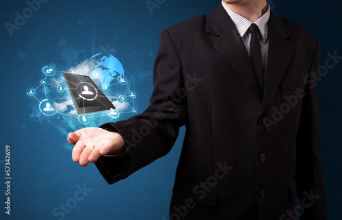 Photo: Cloud technology in the hand of a businessman Cloud technology in the hand of a businessman
