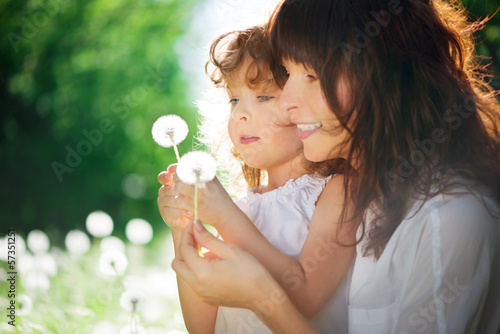 Photo: daughter with her mother together outdoors daughter with her mother together outdoors