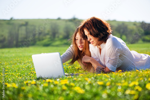 Photo: mother with daughter relaxing mother with daughter relaxing